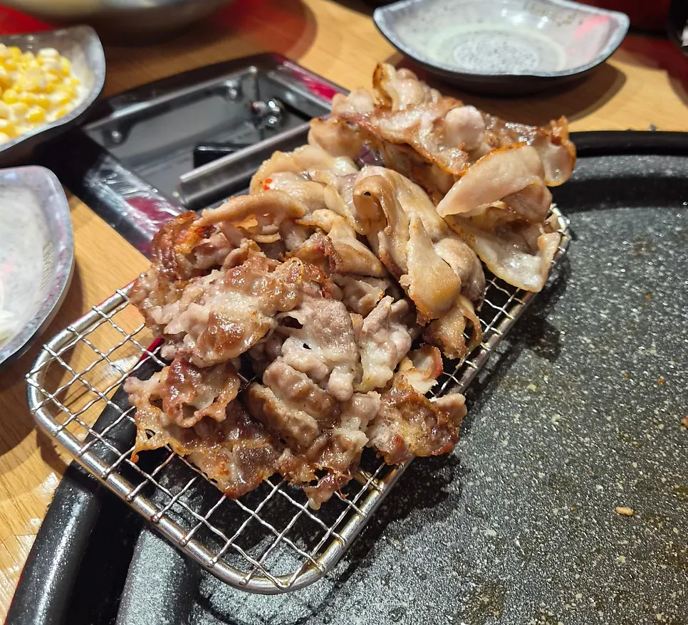 Thin-sliced meat grilled to a golden brown