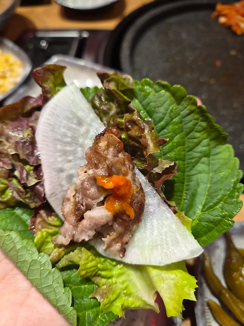 Grilled thin-sliced meat with side dishes