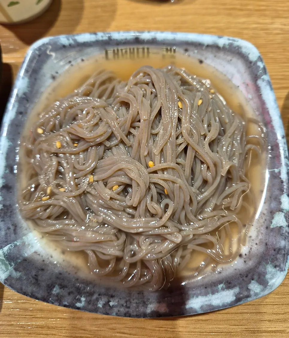 Chewy naengmyeon noodle strands