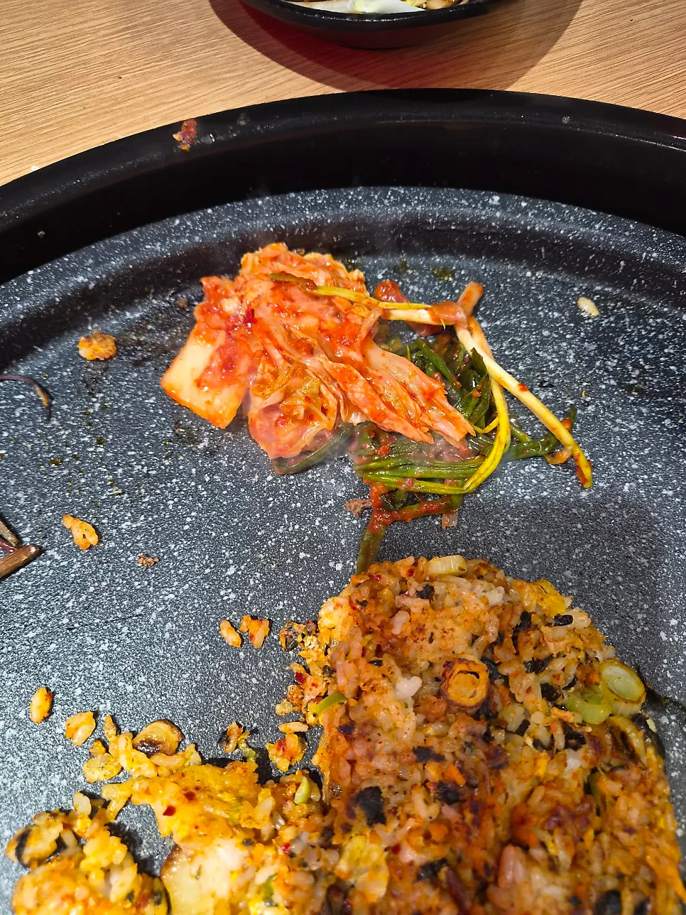 Self-made kimchi fried rice cooked on the grill with kimchi