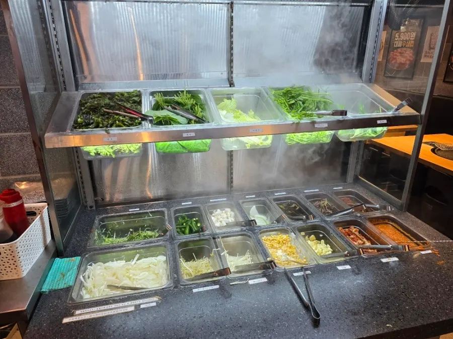 Self-serve bar corner with wrap vegetables