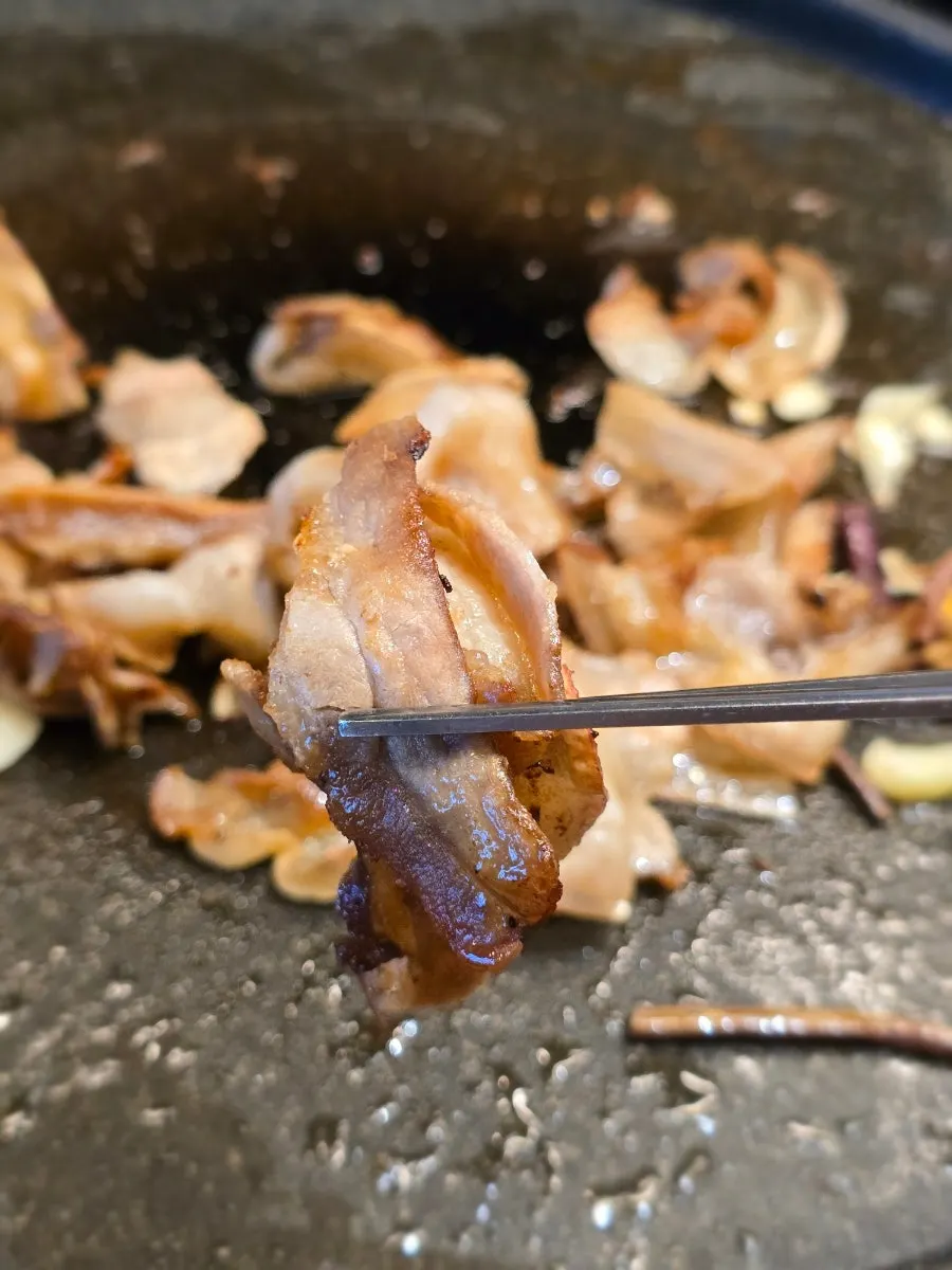 Thin-sliced pork belly cooked to preferred texture