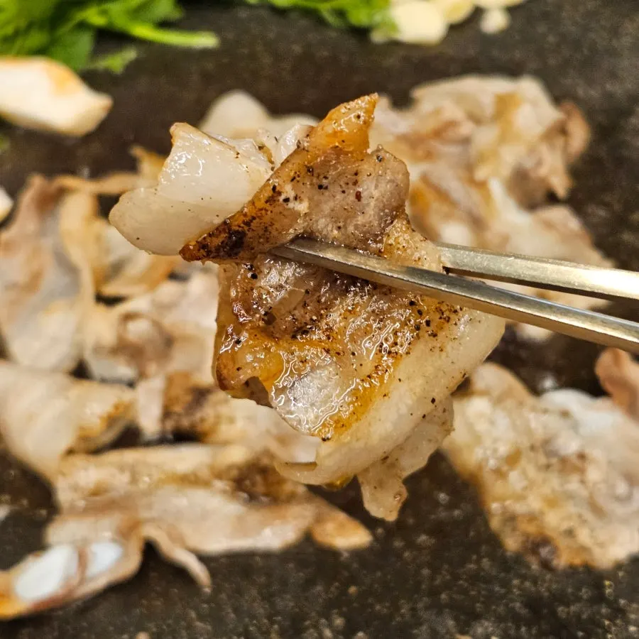 Sliced pork plated right after being cut to order