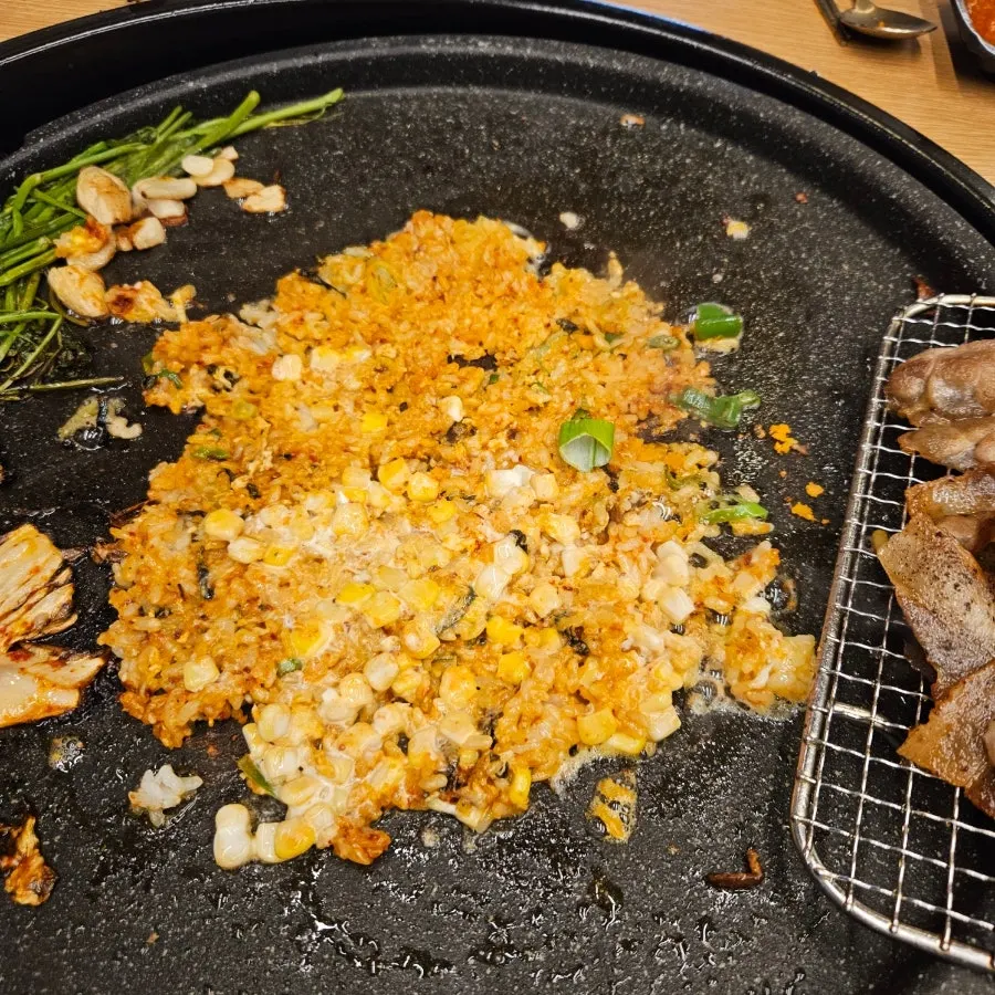 Self-serve fried rice cooking on the grill