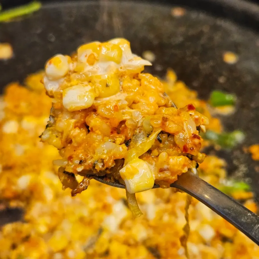 Finished self-serve fried rice with corn kernels