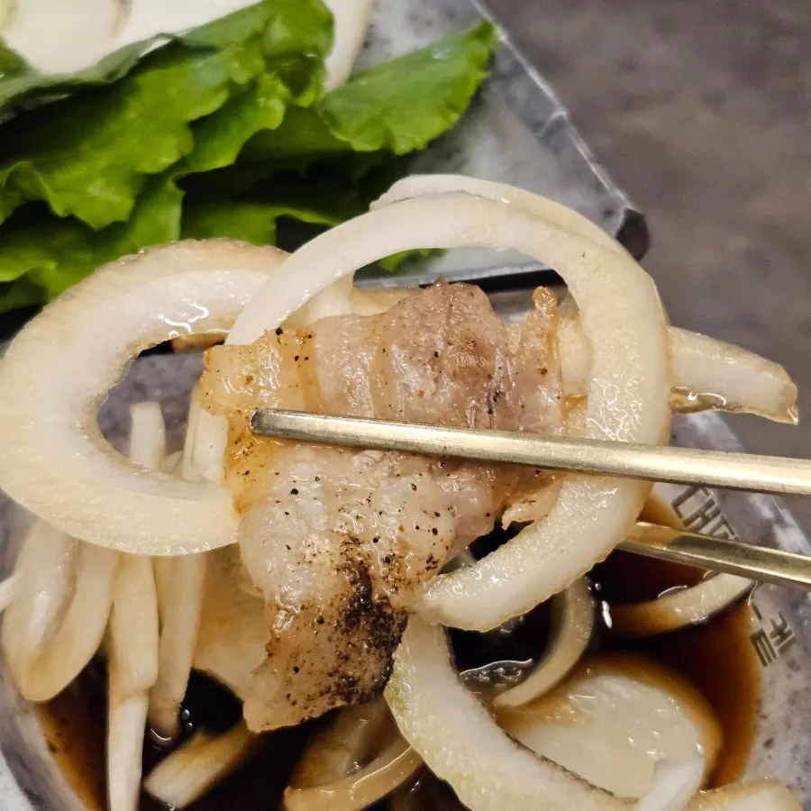 Sliced pork served with self-serve bar accompaniments