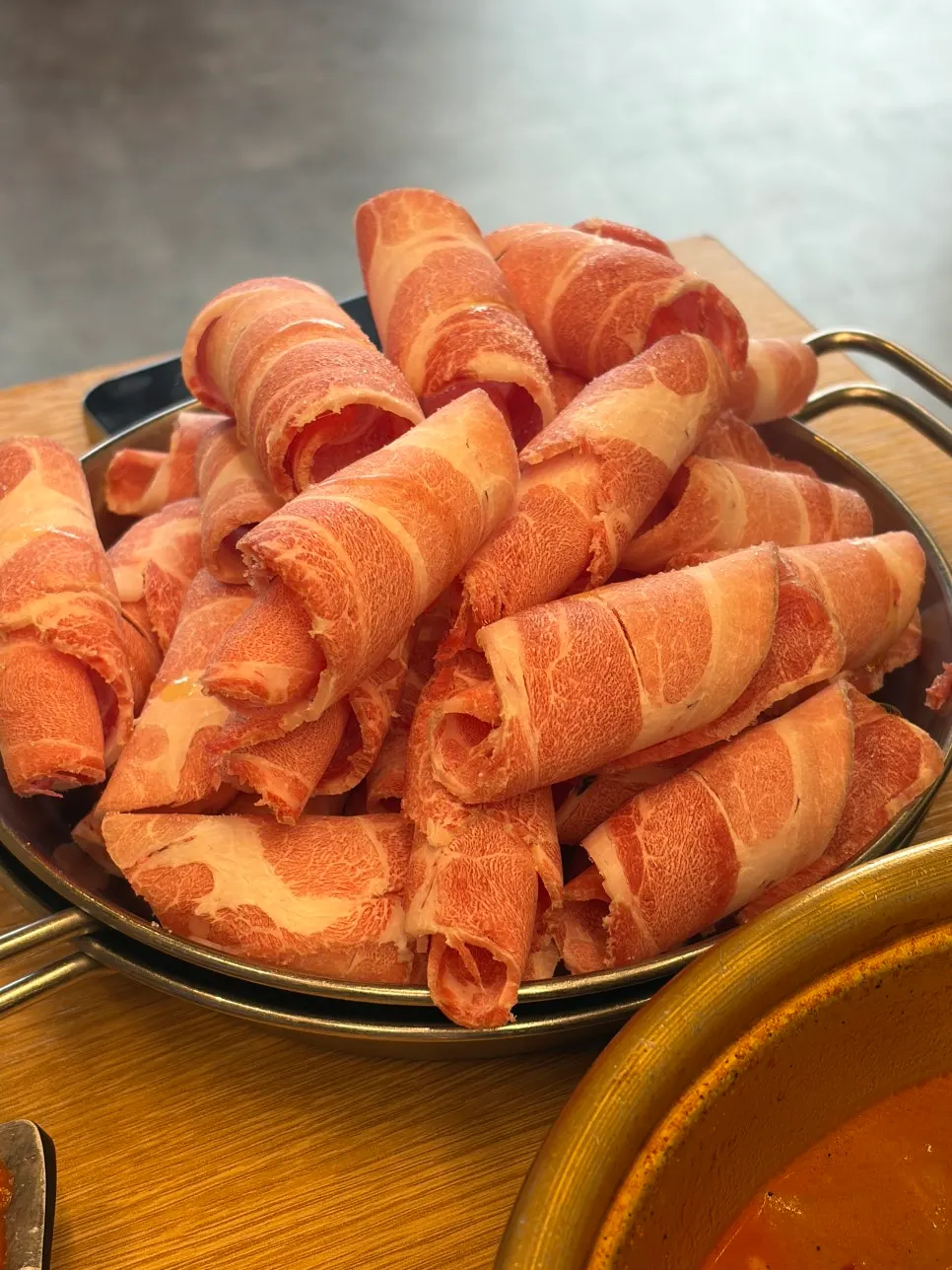 Freshly boiled spicy pork stew served hot