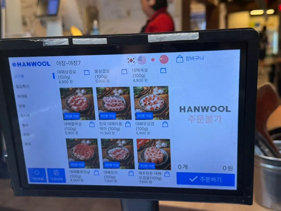 Dining hall with generous spacing between tables