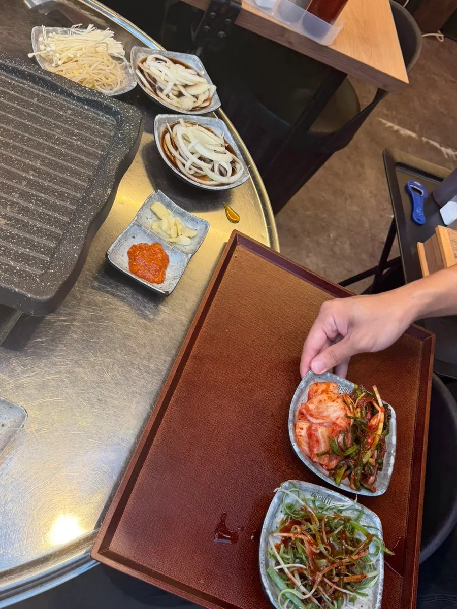 Kimchi and bean sprouts brought from the self-serve bar