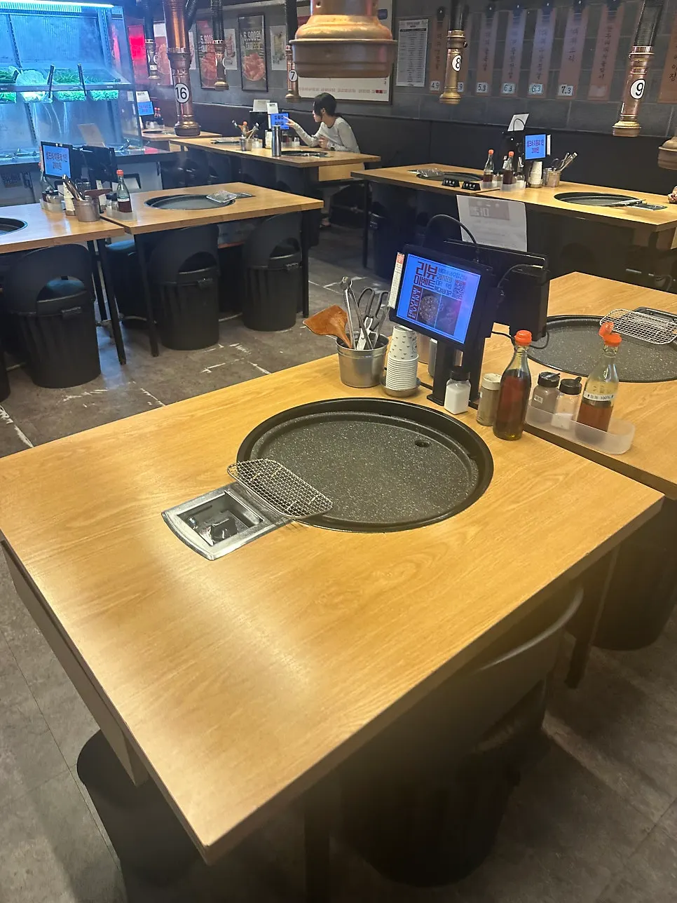 Table and chairs with lift-up lids for storing belongings