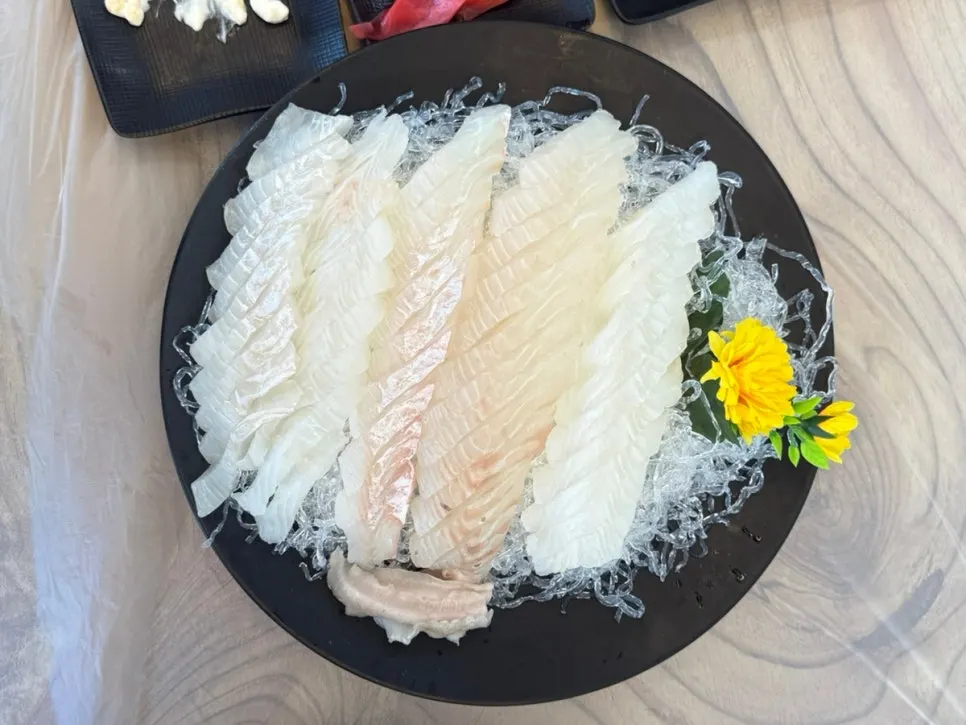 Flounder sashimi spread at Sinhaeburi Hoejip near Daepo Harbor, Sokcho