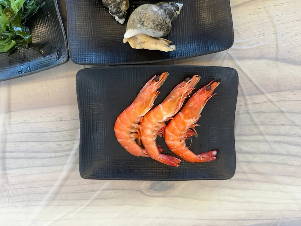 Plate of conch banchan at Sinhaeburi Hoejip