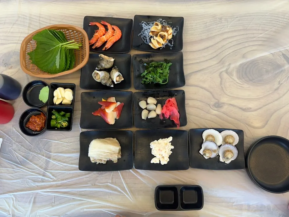 Soy sauce, ssamjang, chili, and garlic on a plate