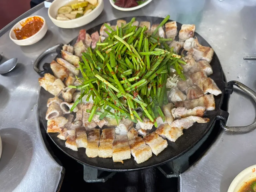Grilled gopchang cut by a staff member
