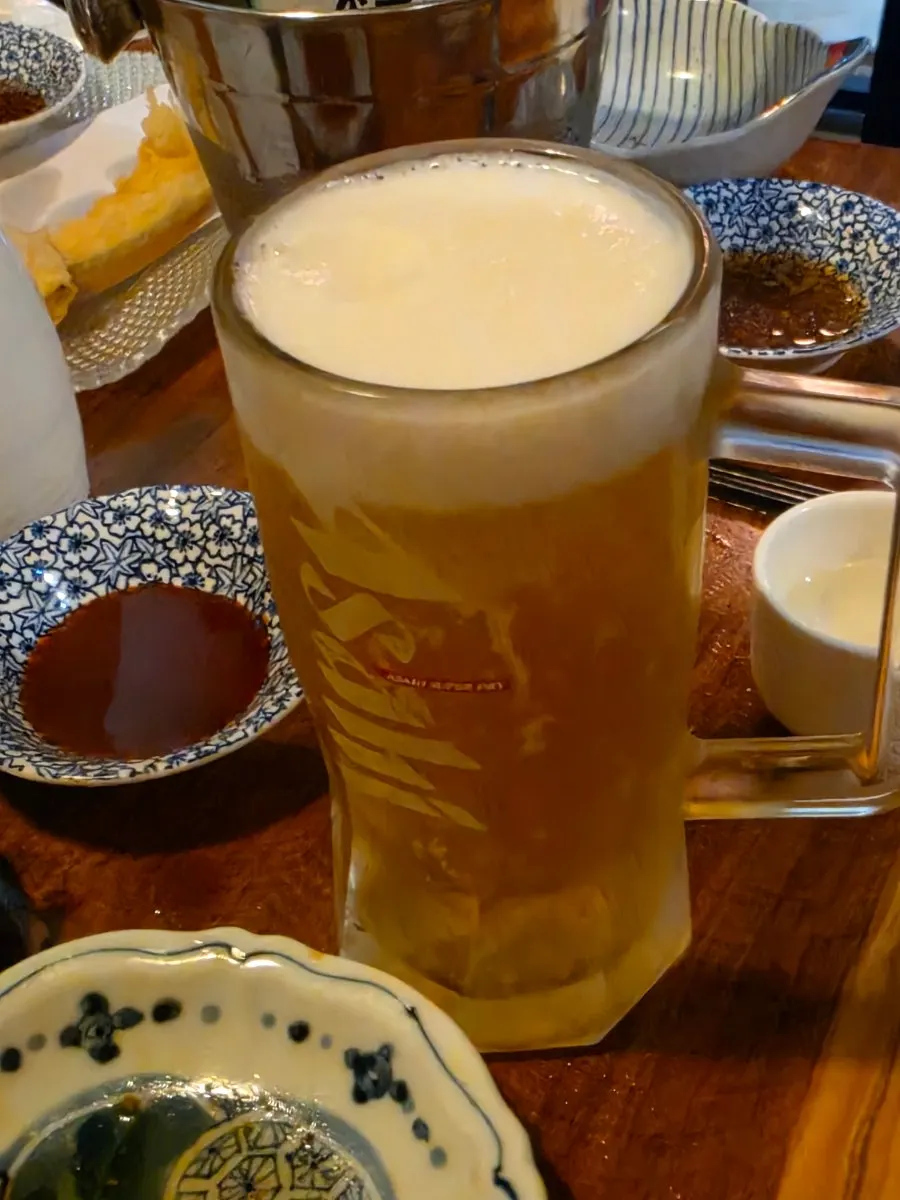 Shrimp and sweet pumpkin tempura with a glass of Asahi draft beer