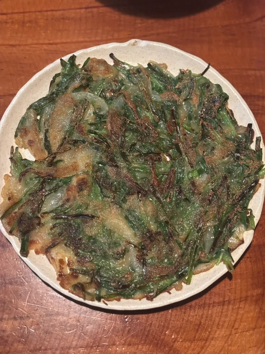 Freshly fried pajeon served as a free side dish