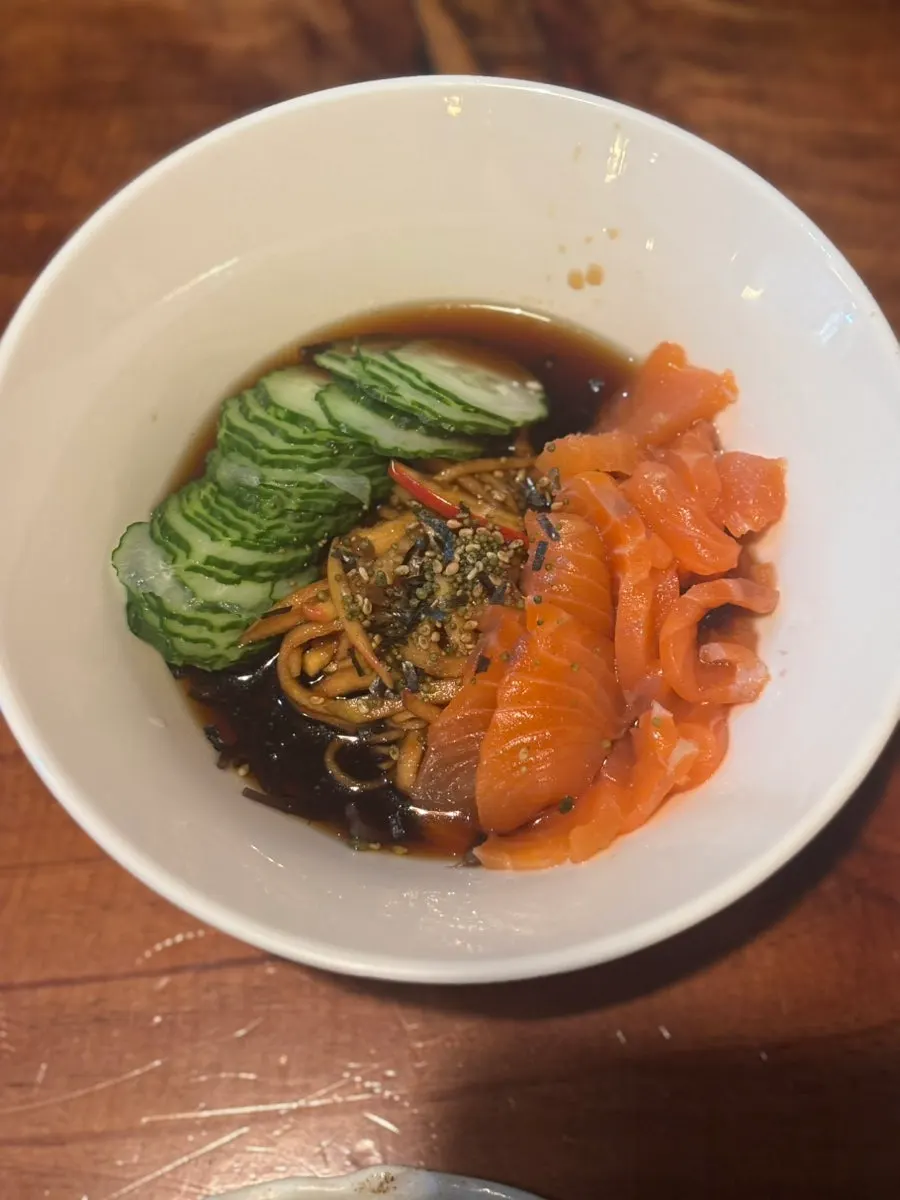 Salmon carpaccio served as a free side dish