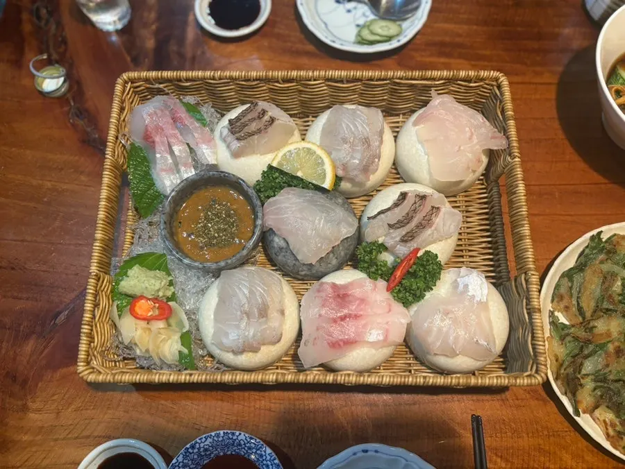 Table with free side dishes and soju