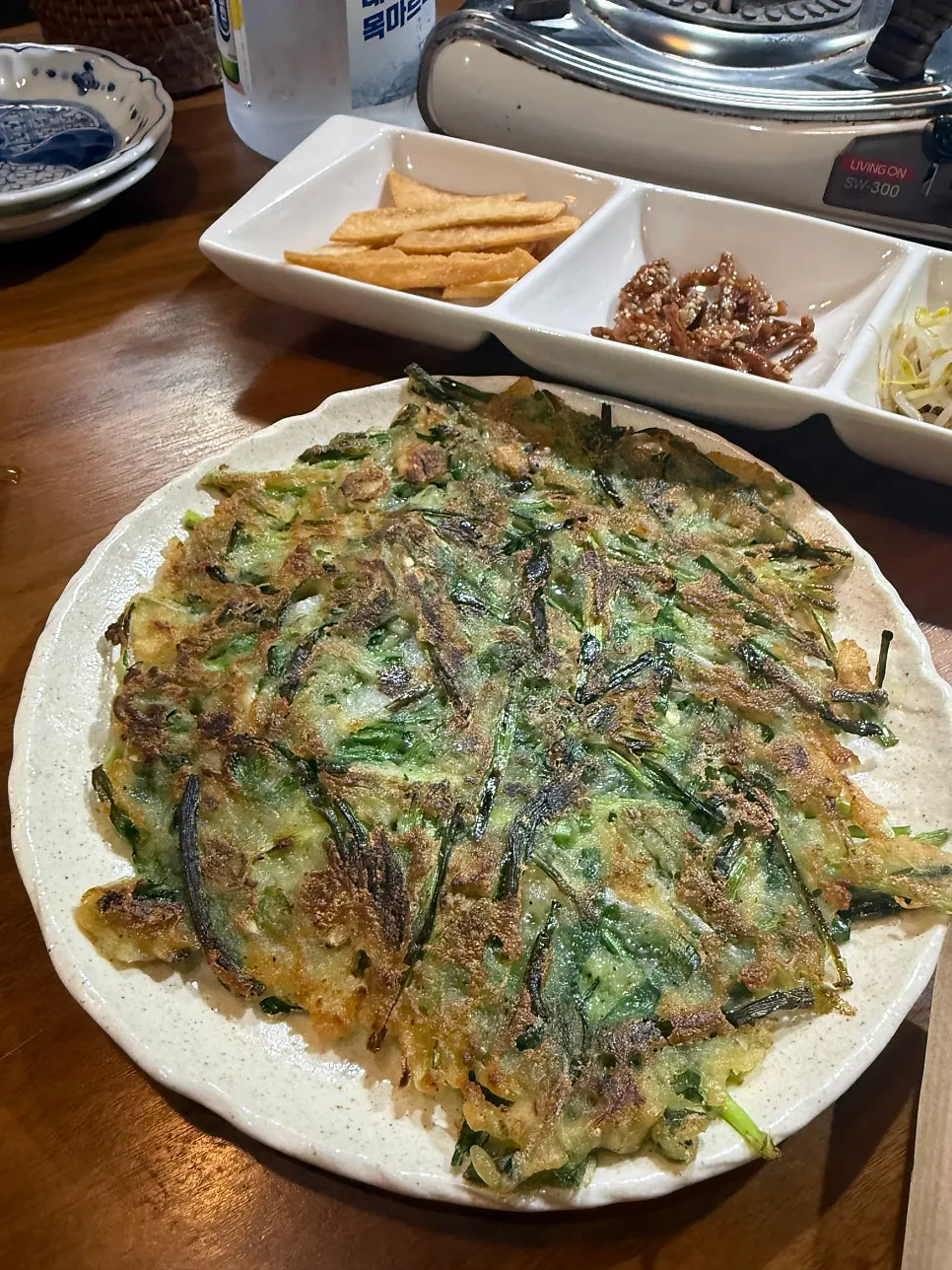 Stir-fried anchovies and seasoned bean sprouts served as basic side dishes