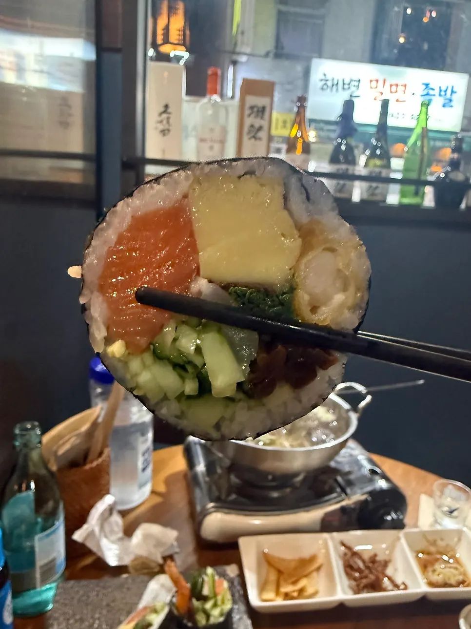 Futomaki filling with salmon and shrimp visible
