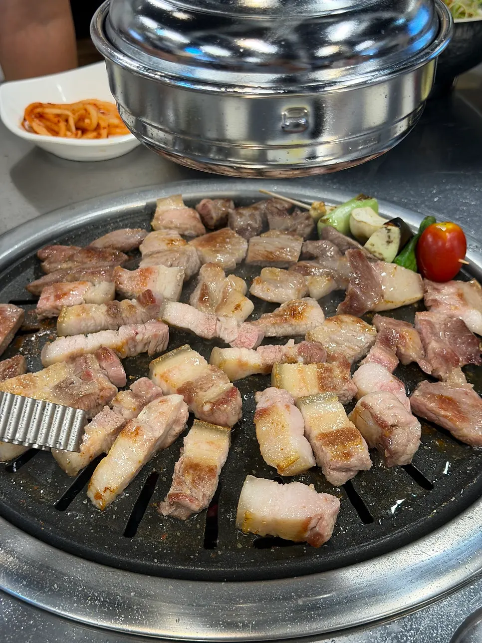 Black pork dipped in salt before eating
