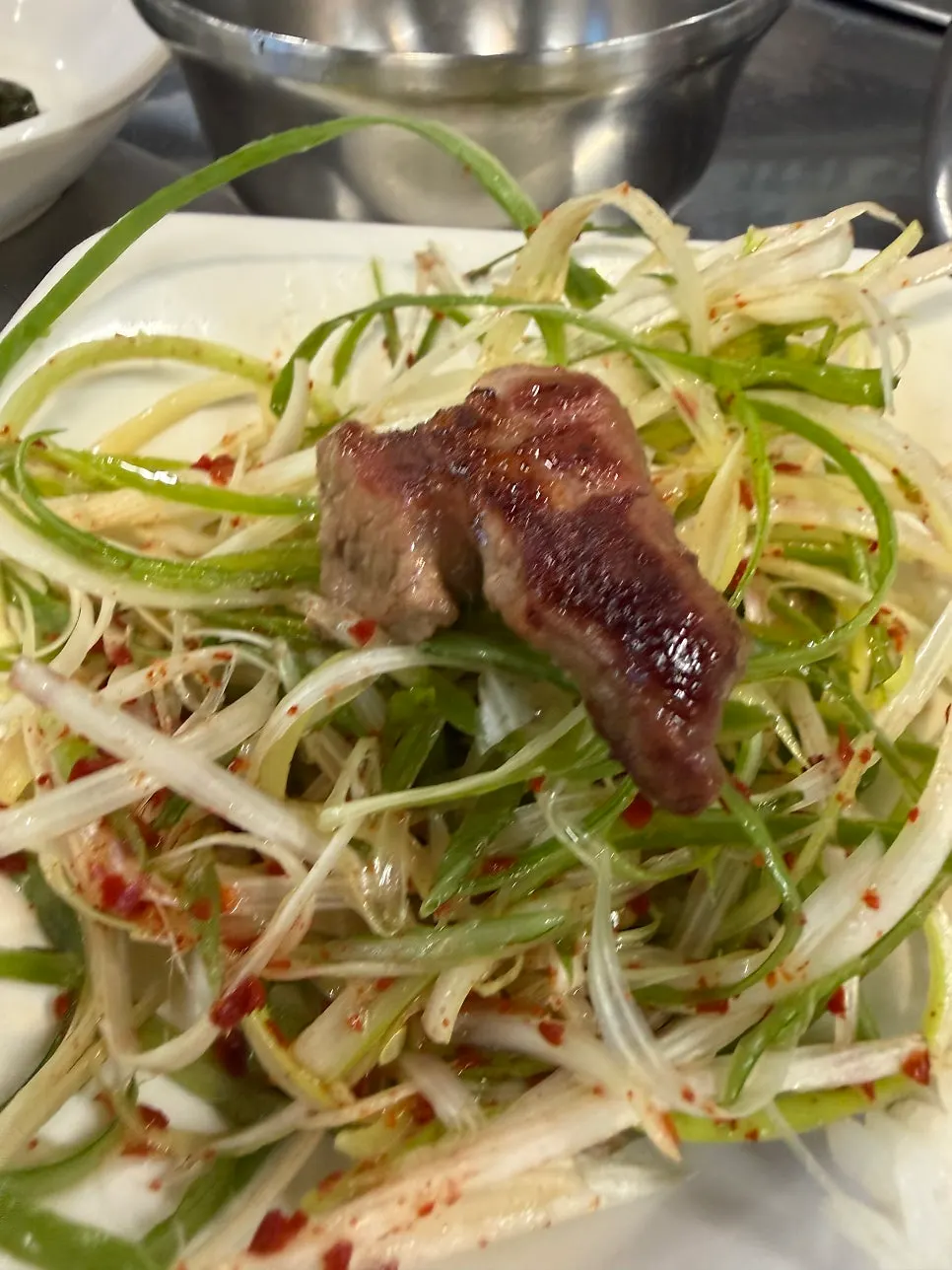 Fully cooked black pork combo with green onion salad