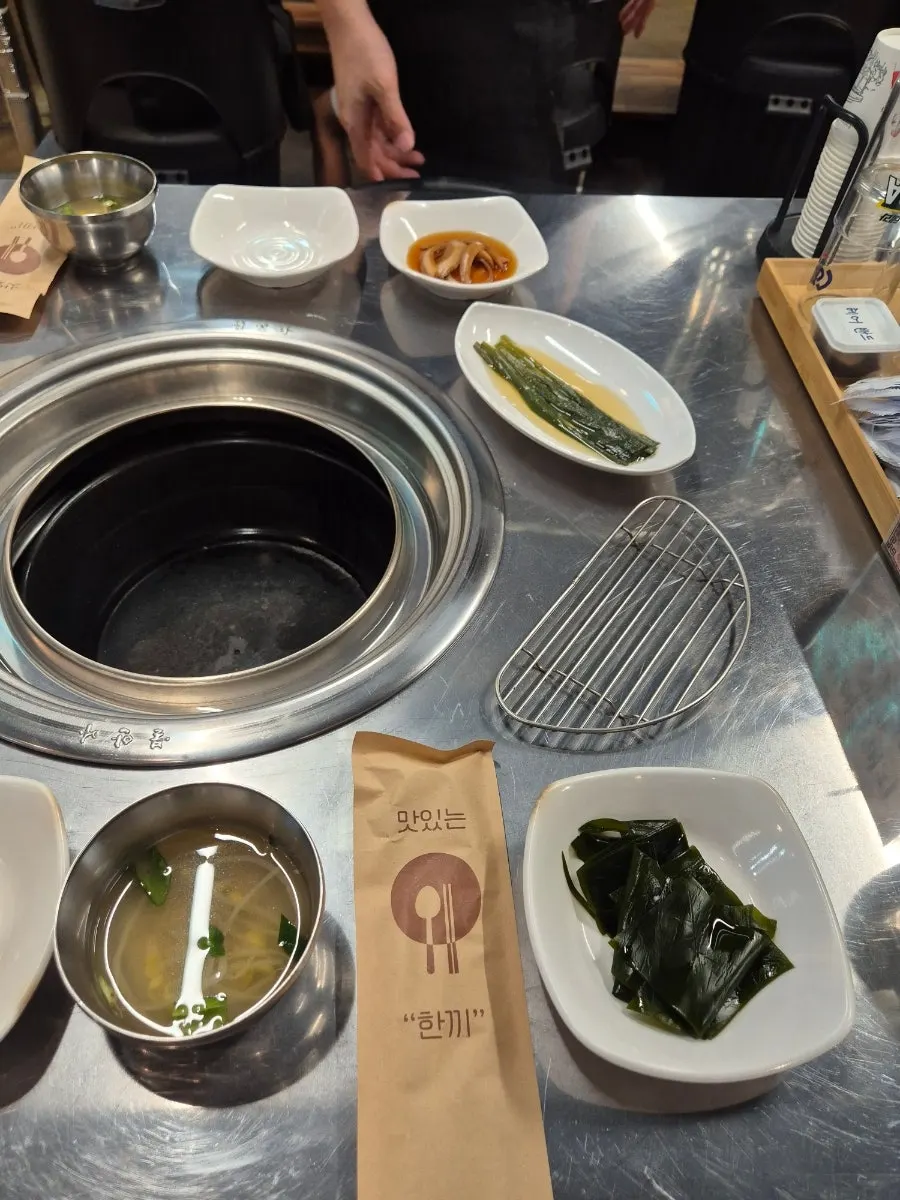 Meal menu board listing galbitang and mul-naengmyeon set