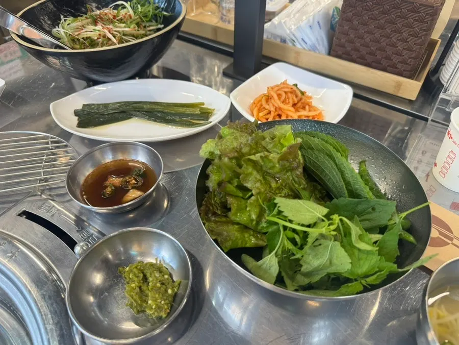 Basic side dishes including salad and pickled onions