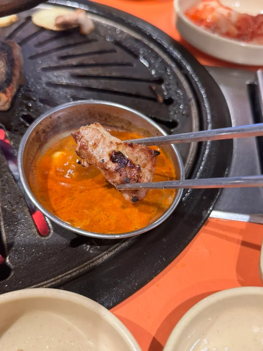 Raw rib dipped in salted seafood condiment