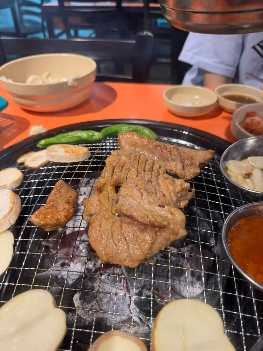 Marinated ribs placed on the grate