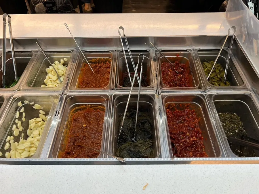 Self bar corner with side dishes and grilling ingredients