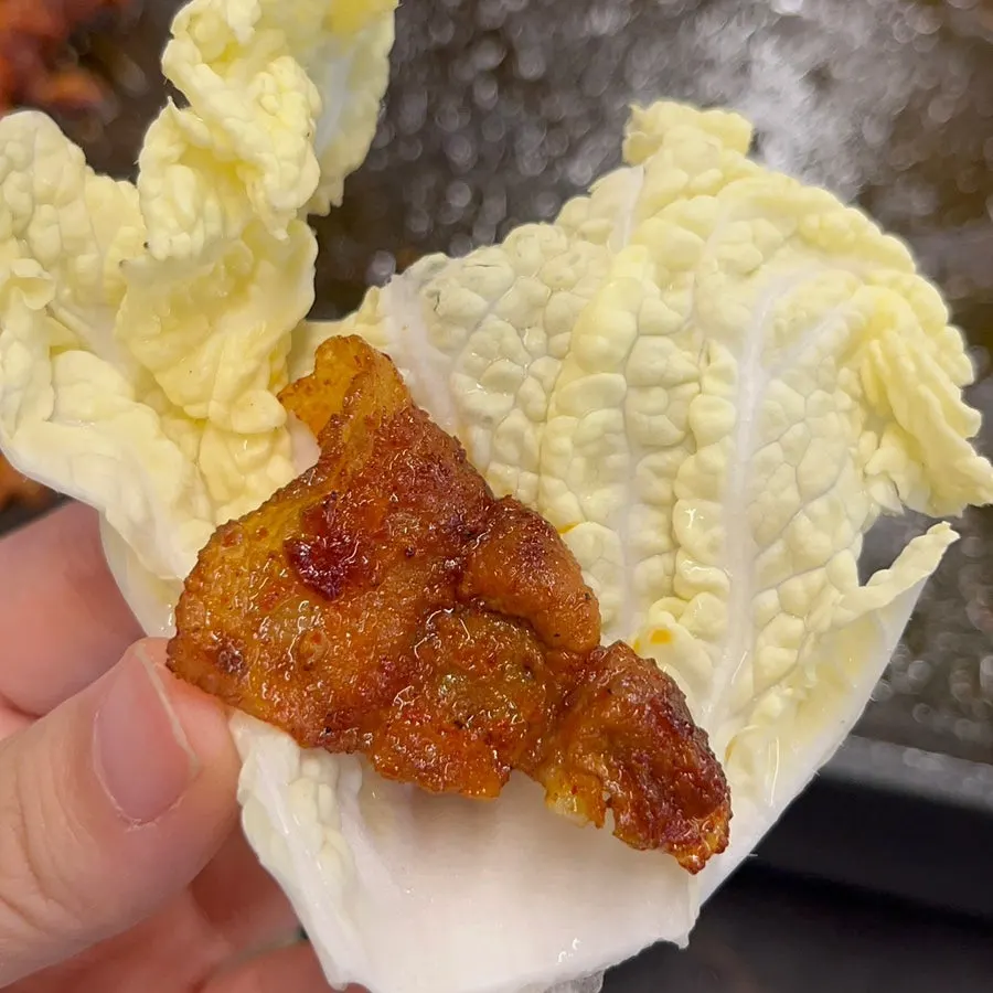 Gochujang daepae pork belly wrapped in napa cabbage