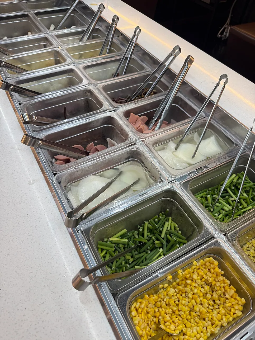 Spacious, clean seating inside Daepae Maket Daeyeon Branch