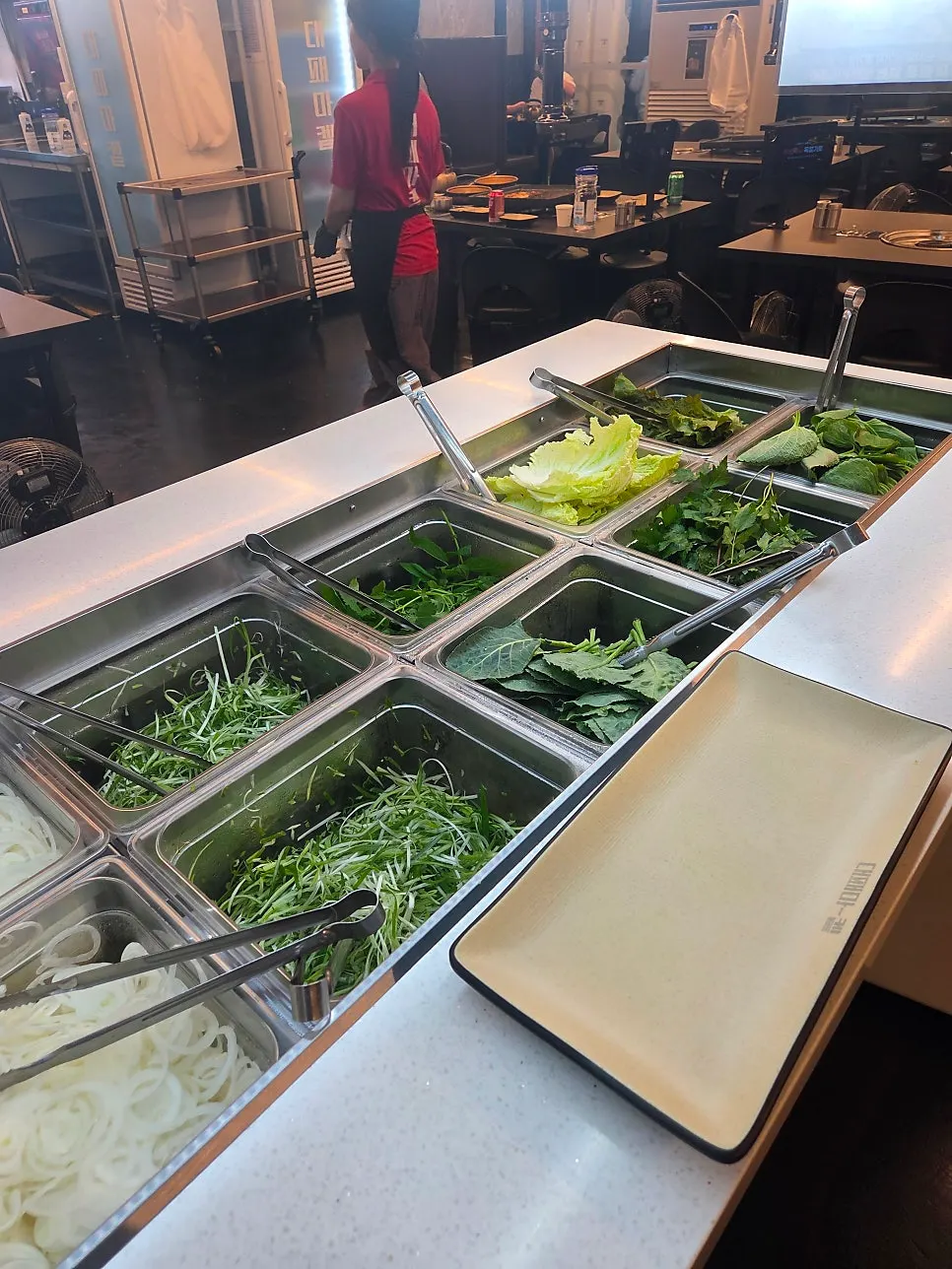 Fresh lettuce and wrap vegetables at the self-bar