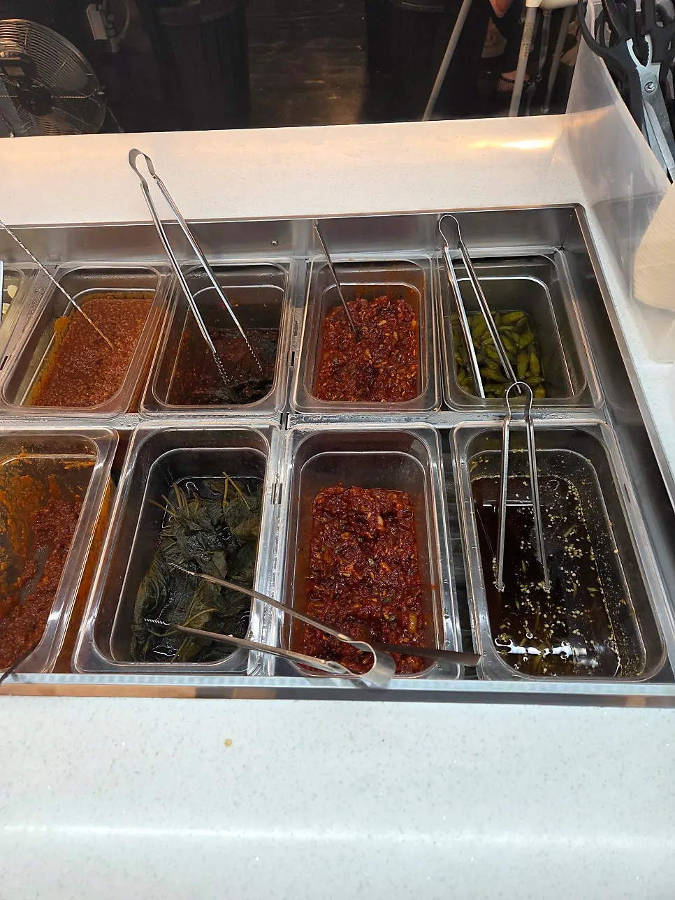 Seasoned fish roe and perilla leaves at the side dish counter