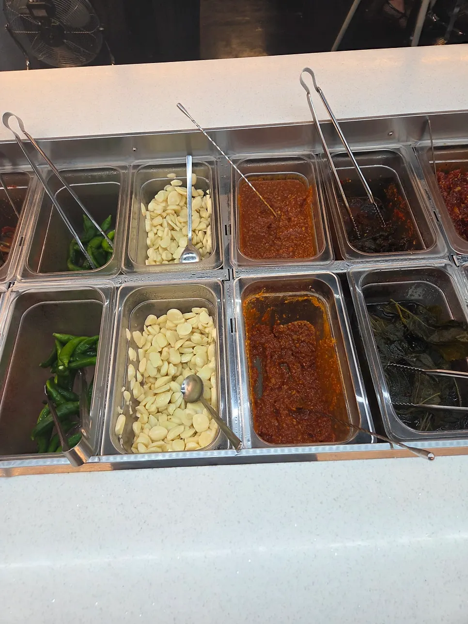 A plate of side dishes gathered from the self-bar
