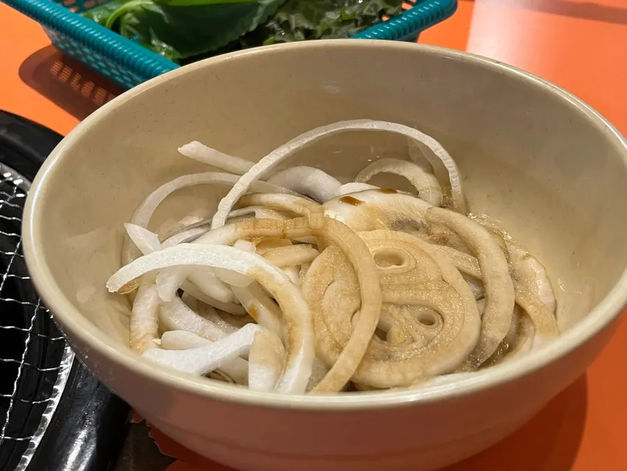 Marinade sauce and onions among the side dishes