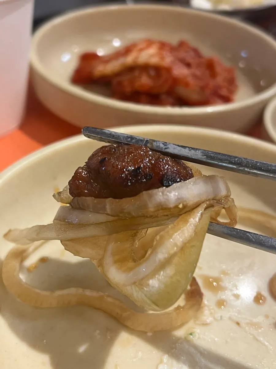 A burger made with morning bread and pork rib