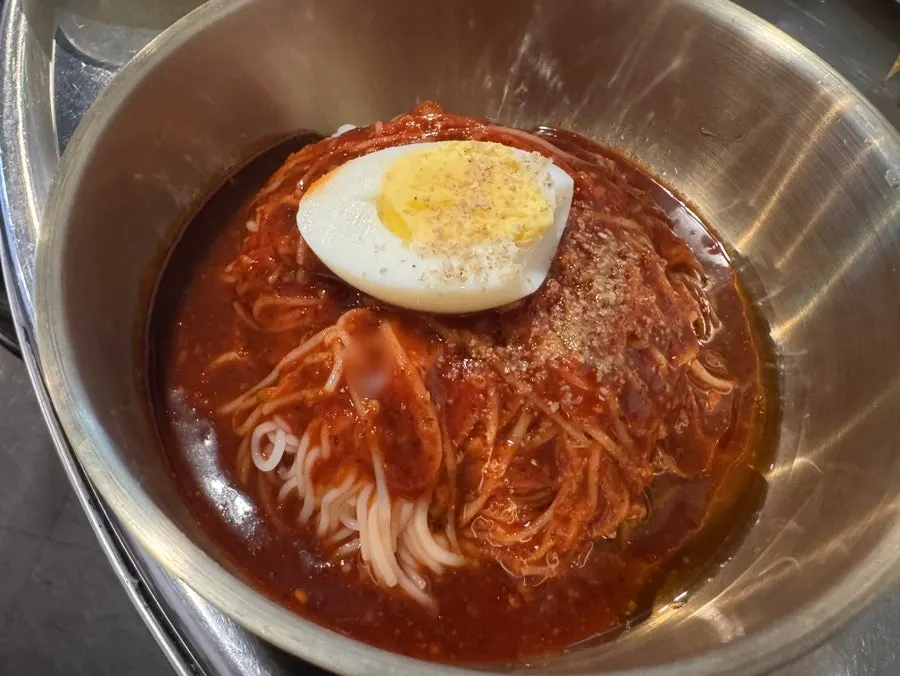 A bowl of bibim guksu served to finish the meal