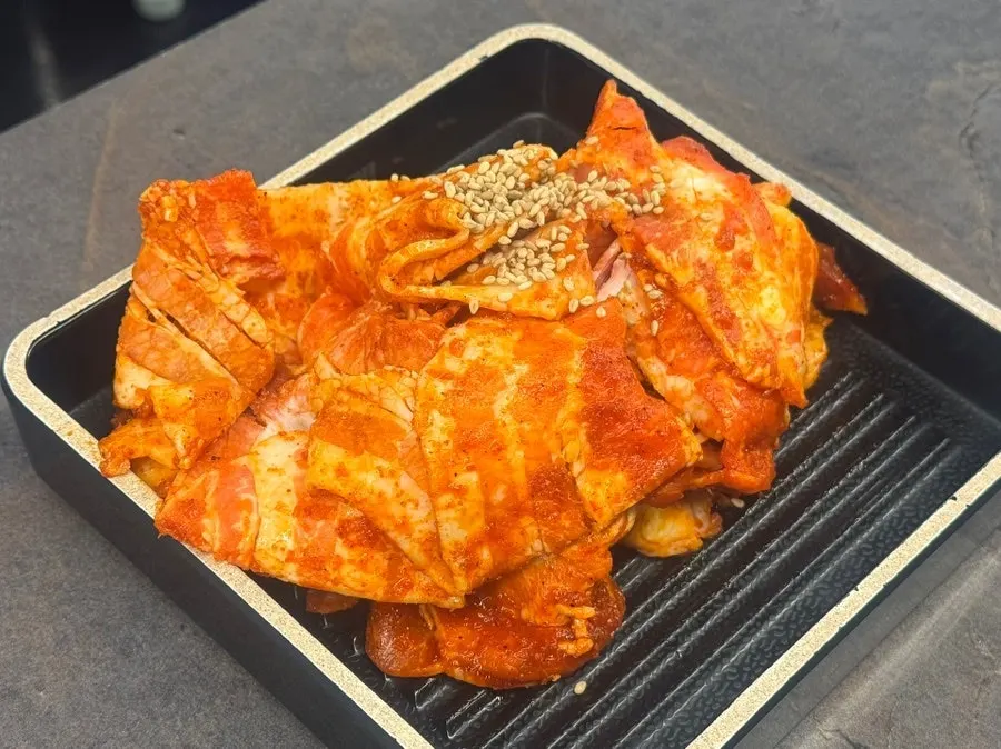 Meat paired with spicy fire sauce