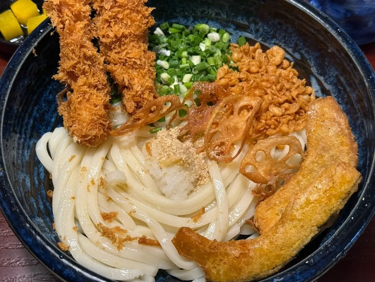 Full spread of tenbutsu bukkake udon and combo set at Misikga-ui Udon Daeyeon Direct Branch