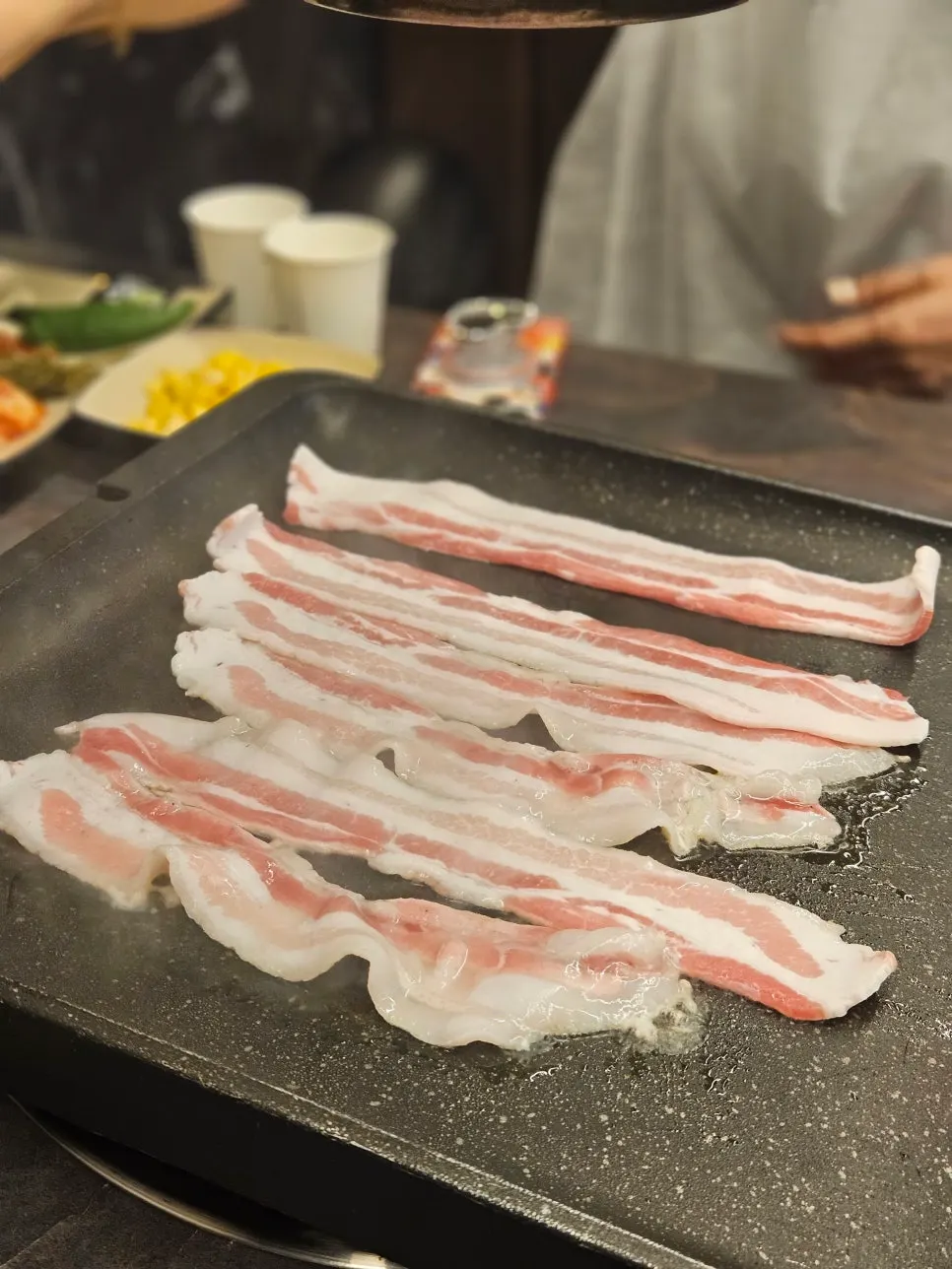 Jeju thin-sliced pork belly on the grill