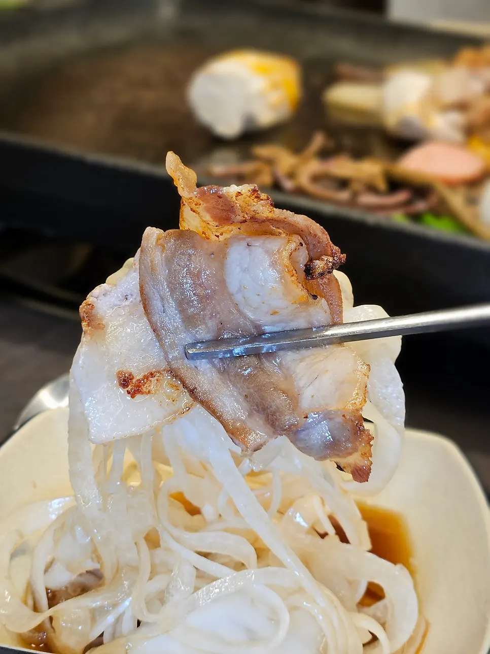 Juicy grilled thin-sliced pork belly