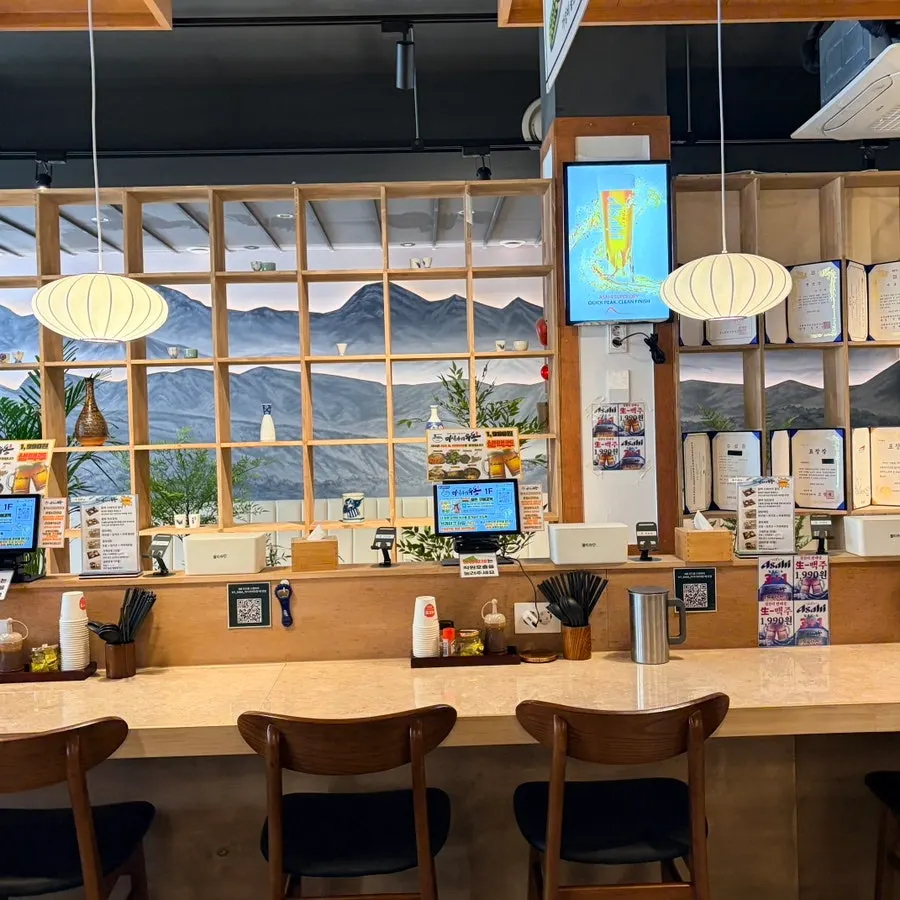 Entrance with a sign for the summer seasonal cold buckwheat noodles and kongguksu