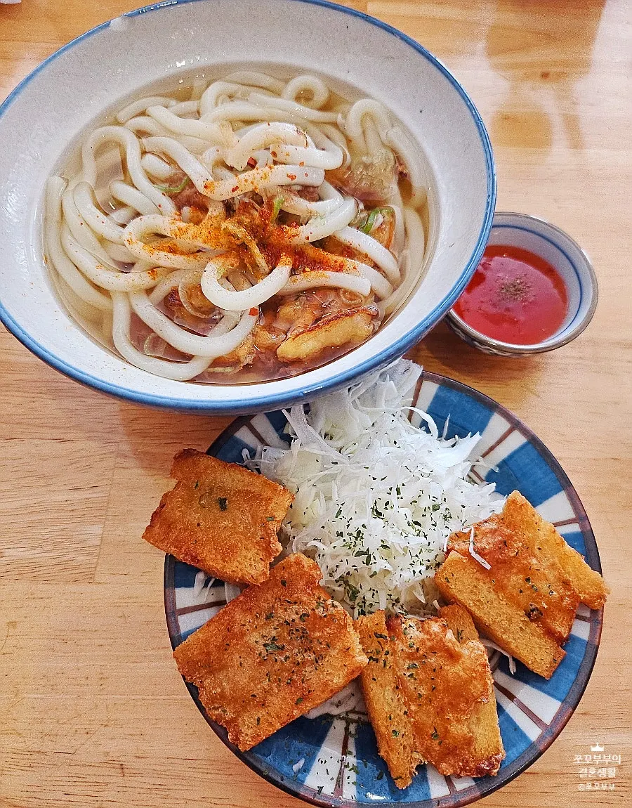 Tonkatsu served alongside fried dishes in the 2-person set