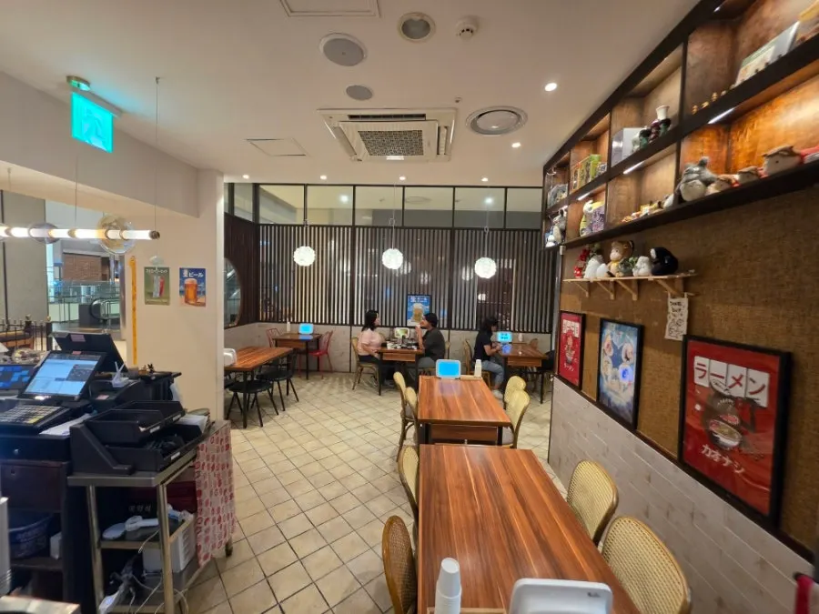 Neatly arranged seating in the department store food court