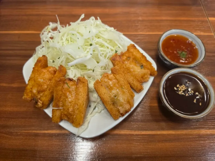 Close-up of crispy fried shrimp menbosha
