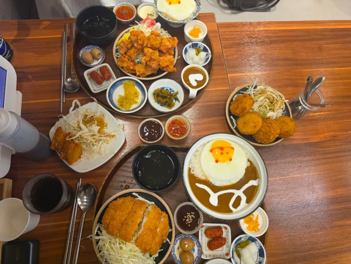 Full spread of the set meal with main dish and sides