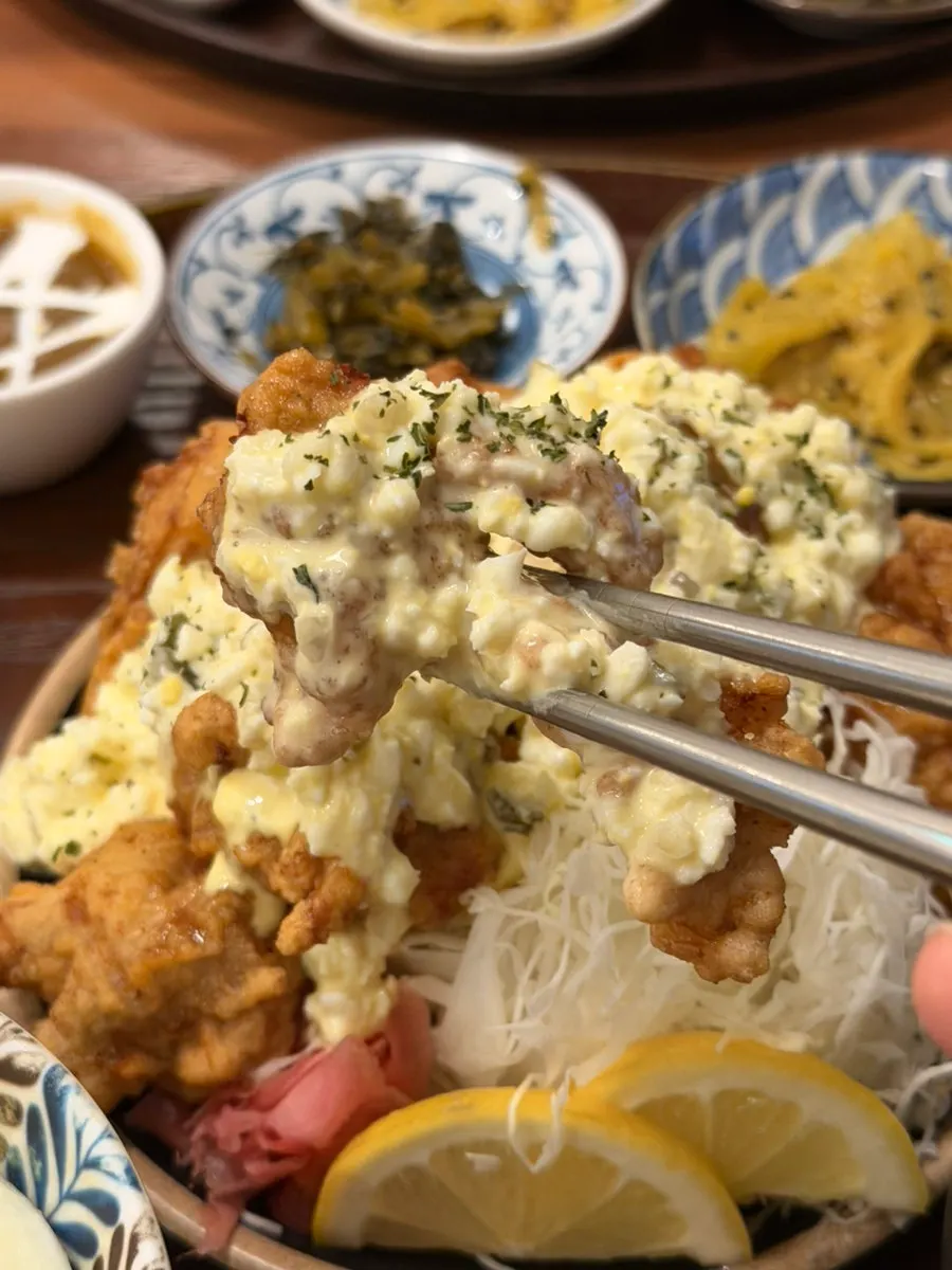 Savory sauce over crispy fried chicken