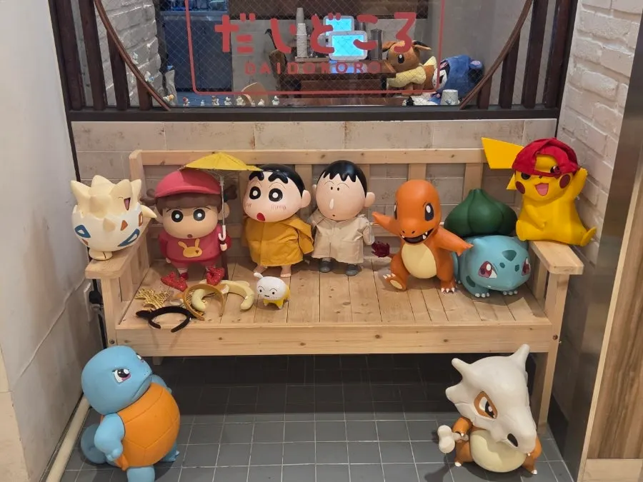 Photo zone with dolls at the store entrance